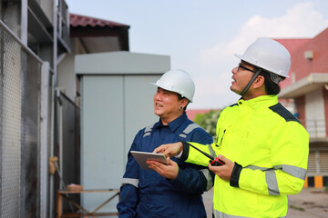 Portrait of professional man engineer working checking work place to keep liquid helium in industry.
