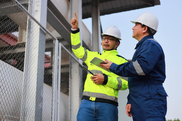 Portrait of professional man engineer working checking work place to keep liquid helium in industry.