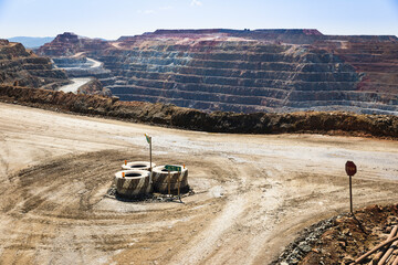 a dirt road in the open pit mining exploration yard at Minas de Riotinto, province of Huelva,...