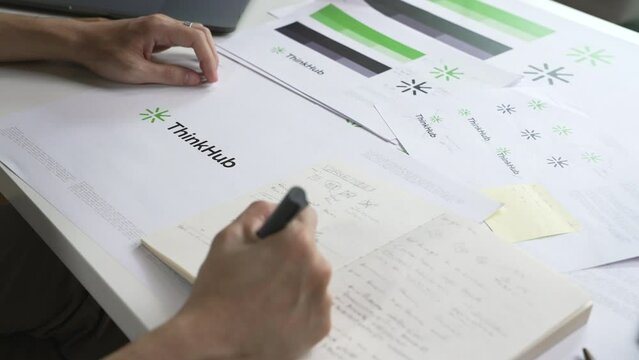 Young Asian Graphic designer working in office. Designing logo Artist Creative Designer Illustrator Graphic Skill Concept.