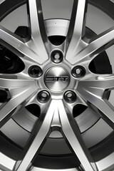 Captivating Display of Gleaming SXT Car Rims Flaunting a Sophisticated Design