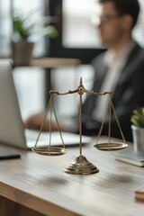 Scales of justice on desk legal concept