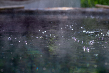selective focus water surface texture background of natural hot springs