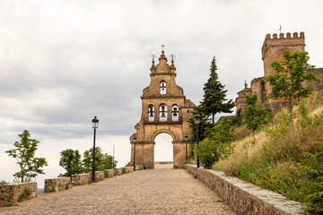 belfry and entry gate to the medieval castle of Aracena city, province of Huelva, Andalusia, Spain