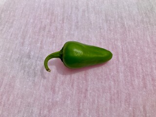 Green chili pepper. green chili pepper on background. jalapeno pepper. clipping path and full depth of field. Ripe green hot chili. 