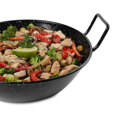 Stir-fry. Tasty noodles with meat and vegetables in wok isolated on white