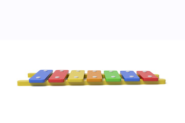 Multicolored xylophone on a white background