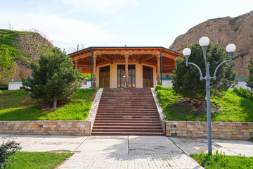 Wooden gazebo in the Khoja Doniyor (Saint Daniel) Park on the side of the Afrosiyab Hill in Samarkand, Uzbekistan