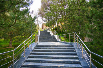 Obraz premium Stairway leading up to the Khoja Doniyor (Saint Daniel) Mausoleum on the side of the Afrosiyab Hill in Samarkand, Uzbekistan - Famous shrine sacred to Islam, Christianity and Judaism