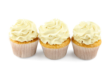 Tasty vanilla cupcakes with cream isolated on white