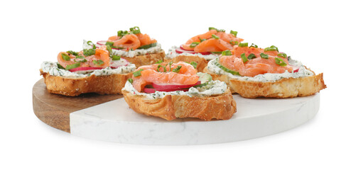 Tasty canapes with salmon, cucumber, radish and cream cheese isolated on white