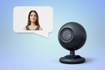 Woman in a chat bubble and webcam on blue backdrop