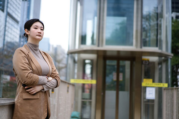 Confident Professional Woman in Urban Setting
