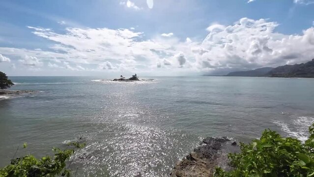 Stunning bay of Dominical. A pan over the surf beach Dominicalito. Paradise for surfers and nature lovers.