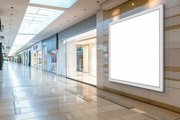 Blank advertising board in the glass window of the store
