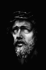 Ancient statue of Jesus Christ. Faith, religion, Christianity, God concept. Black and white...