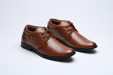 tan leather formal shoes isolated on white background