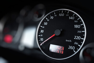 Car speedometer. Close up shot of a speedometer in a car.