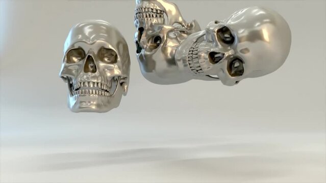 3d animation. falling rubber skulls