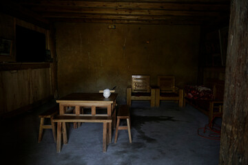 Traditional home of Lo Chai ethnic minority in Ha Giang, Vietnam with wooden furniture