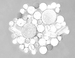 Stack of colourful pills, medicine background. Hand drawn pencil sketch illustration