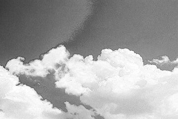 Flying in clouds background. Hand drawn pencil sketch illustration