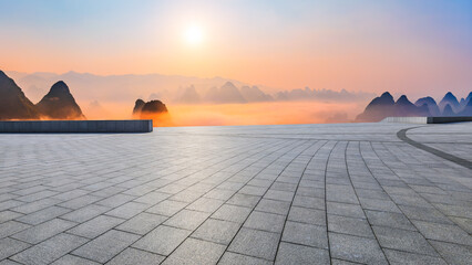 Empty square floor and beautiful mountain with sky clouds at sunrise