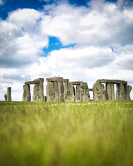 STONEHENGE, WILTSHIRE - JUNE 25 2021: Tourists amongst the standing stones on JUNE 25 2021 in Wiltshire. Construction on the site started in 2600 BC and its purpose remains obscure.