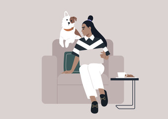 Serene Moments With Spotted Companion, A person is absorbed in work beside a white and brown dog perched on an armchair