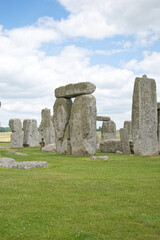 STONEHENGE, WILTSHIRE - JUNE 25 2021: Tourists amongst the standing stones on JUNE 25 2021 in Wiltshire. Construction on the site started in 2600 BC and its purpose remains obscure.
