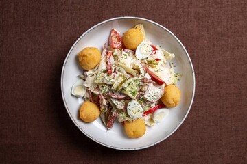 Vegetable Salad with Cherry Tomatoes, Cucumber, Radish, Carrot, Lettuce on Plate