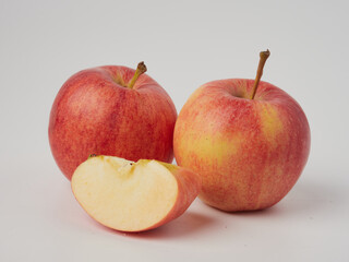 Shiny red apples, isolated on white background.