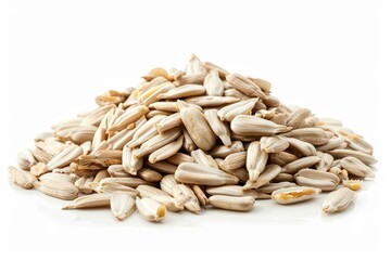 Heap of shelled sunflower seeds on white backdrop
