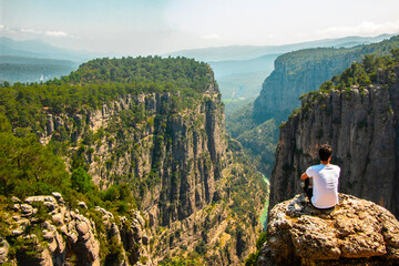 Man watching nature view. Magnificent view and majestic cliff of Tazi Canyon. View of the valley...