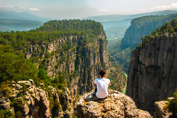 Man watching nature view. Magnificent view and majestic cliff of Tazi Canyon. View of the valley...