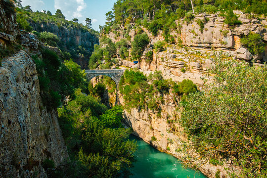 Aerial view of Oluk, the ancient arch bridge over the Koprucay river gorge in Koprulu National Park in Turkey.