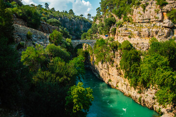 Aerial view of Oluk, the ancient arch bridge over the Koprucay river gorge in Koprulu National Park...