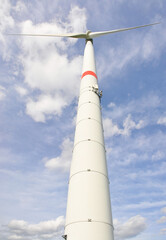 Wind turbines. Power generation. huge windmill against the sky