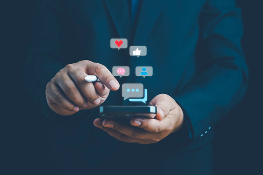 Social media and digital online concept, man using smart phone. The concept of living on vacation and playing social media. Social Distancing ,Working From Home concept. Social media concept.