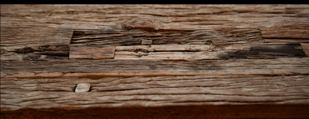 Old brown wooden texture. Weathered wooden background with seamless inclusions and cracks.