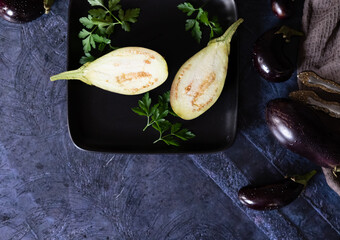 Hands holding a large plate with various fresh farm vegetables. Diet. Balance. The concept of healthy organic food