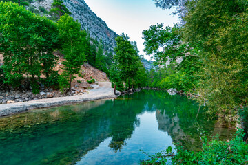 Fototapeta premium Magnificent view of Uzumdere Canyon. The water of the stream, which is a wonder of nature, is clean and icy.