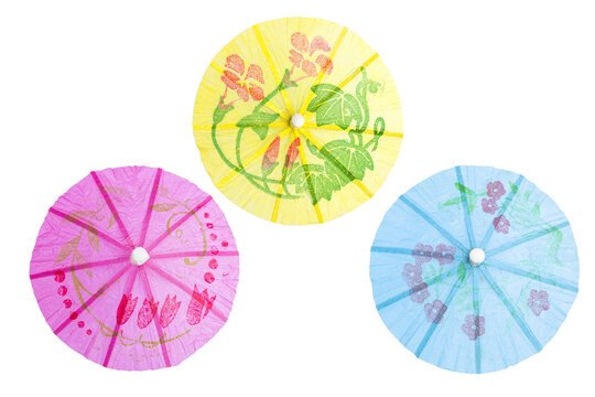 Design paper umbrella isolate on white background, cocktail decoration, paper umbrella with flower pattern