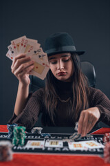  woman plays in a casino and raise bets to change big win, play at poker