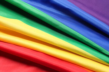 Rainbow LGBT flag as background, closeup view