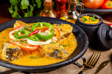 Moqueca de dourado com tempeiros e pimenta foto do detalhe