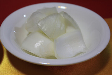 sliced onions on a plate