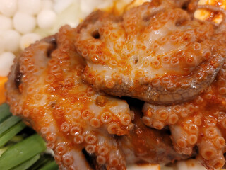 stir-fried spicy seafood on a plate