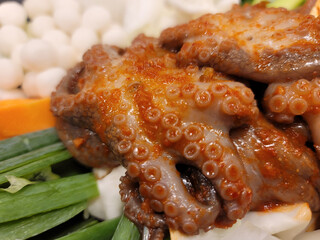 stir-fried spicy seafood on a plate