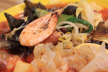 stir-fried spicy seafood on a plate